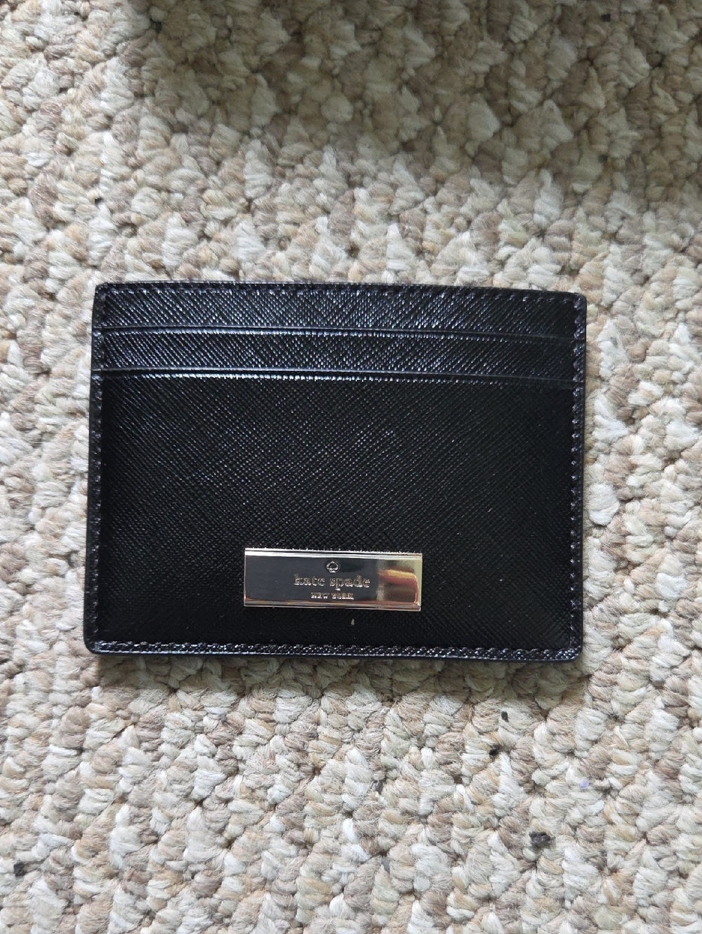 kate spade black leather card case with gold logo plate